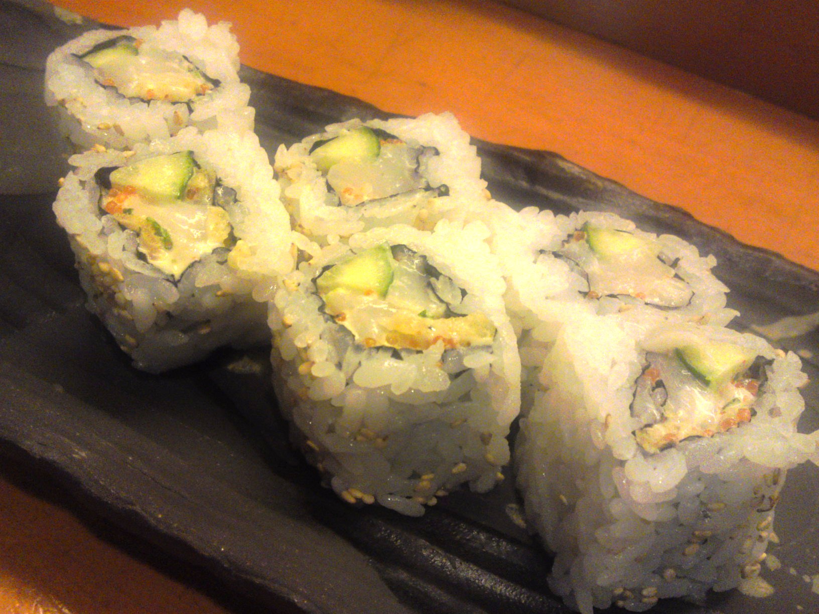 A “California roll” made with spicy raw scallops and cucumber