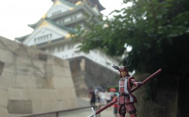 Sanada Yukimura figure in front of Osaka Castle.