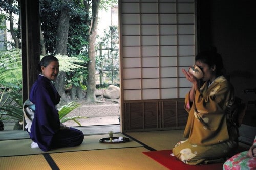 Drinking tea at tea ceremony session in Izumi