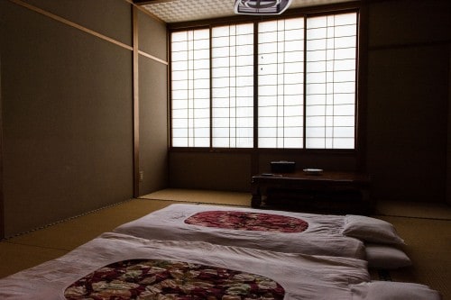 Futon sets on tatami room at Minshuku Takimoto on Sado island, Niigata, Japan