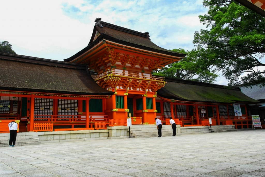 People pray at Usa jingu, a traditional Japanese shrine in Japan