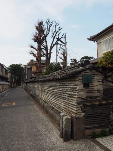 Dobei Wall at Yanesen area in Tokyo, Japan.