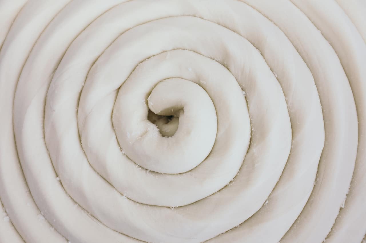 closeup of udon in a coil before it is boiled