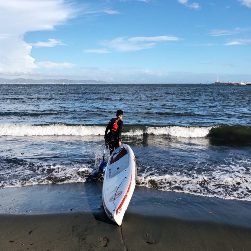 my instructor brings the board into the water