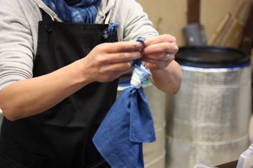 An indigo dyeing craftsperson in Udatsu.