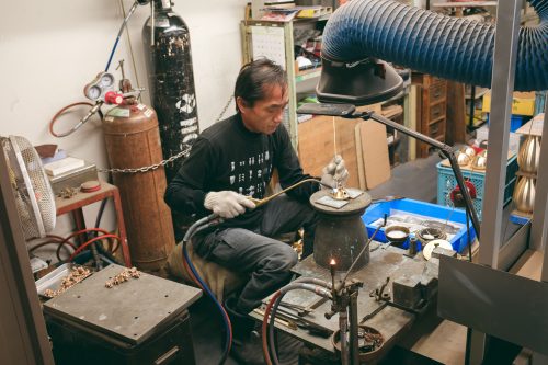 A metal craftsman working at a metal shop in Toyama Prefecture