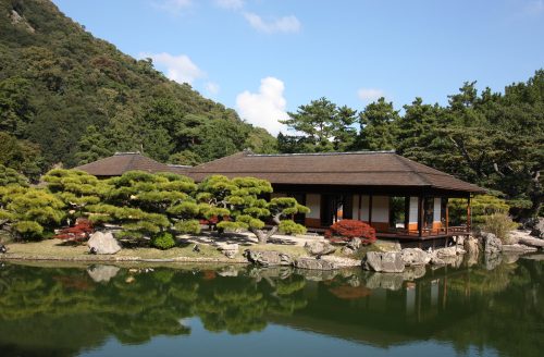 Japanese tea house on a pond in Ritsurin Garden in Takamatsu, Kagawa Prefecture in Eastern Shikoku.