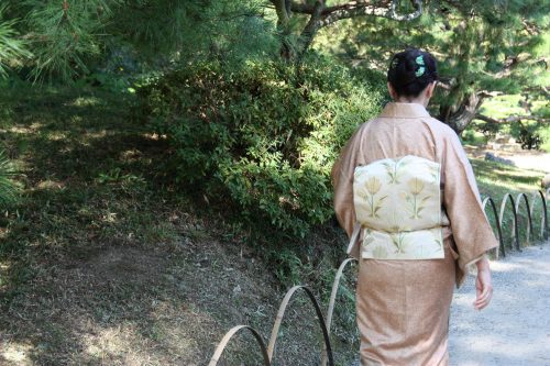 Woman strolls in kimono in Ritsurin Garden in Takamatsu, Kagawa Prefecture in Eastern Shikoku.