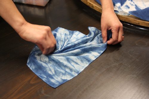 Preparing a cloth for indigo dyeing in Mima town, Tokushima.