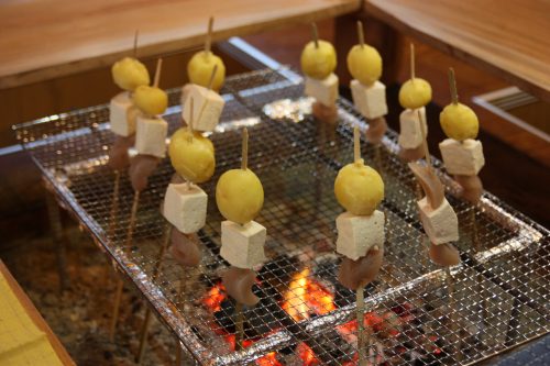 Grilling skewers for dinner at Yuzu No Sato minshuku in Mima town, Tokushima, Shikoku.