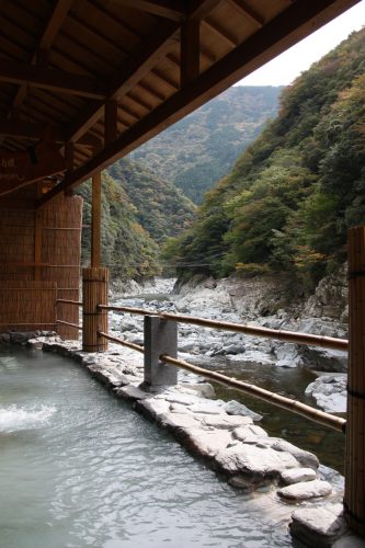 Soak in the hot springs along the river of Iya Valley at Iya Onsen Hotel.