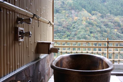 An onsen bath tub at Iya Onsen Hotel, Tokushima.