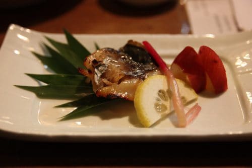 Beautifully presented dishes at Mingeichaya, an izakaya restaurant in Kurashiki, Okayama.