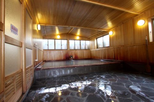 A relaxing bath at Sukayu onsen, Aomori prefecture in the Tohoku region, Japan.