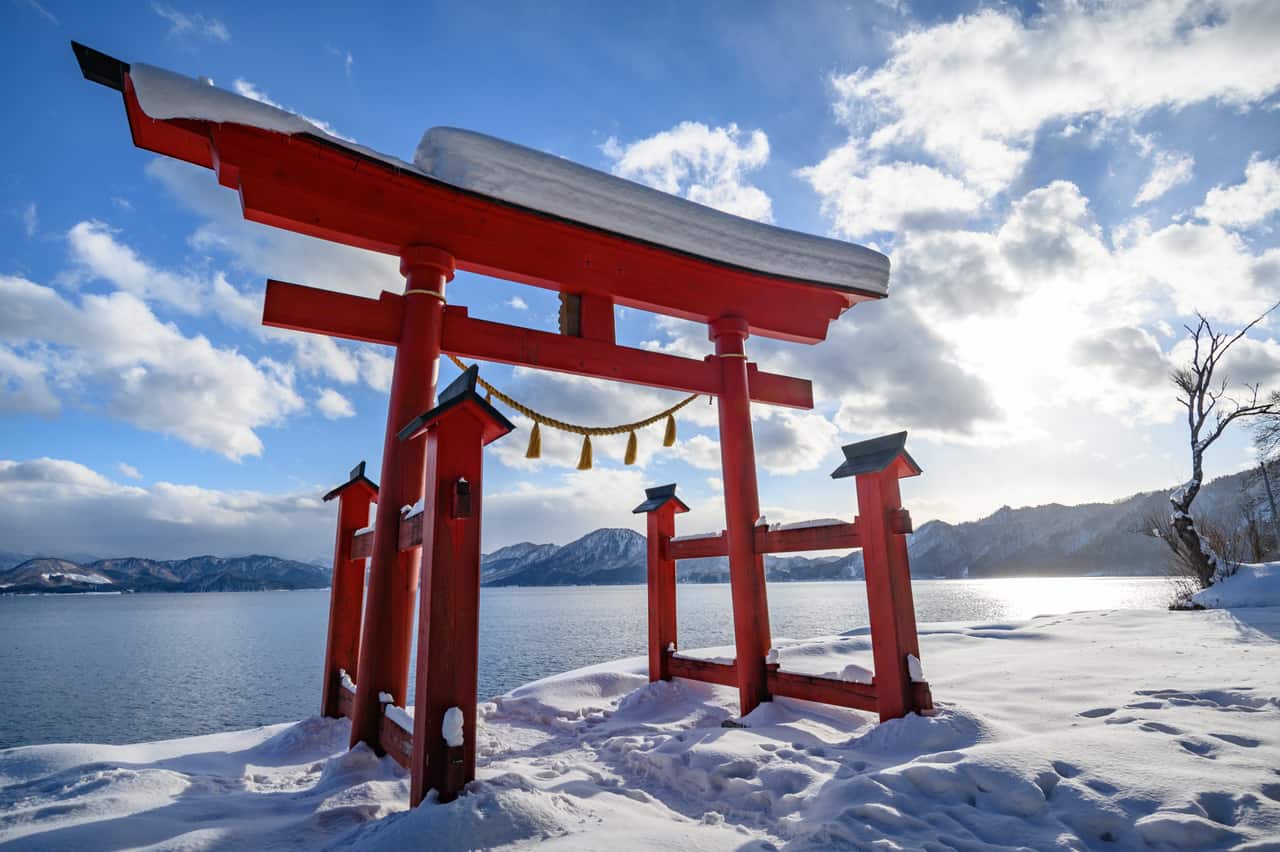 A torii surrounded by snow in Akita Prefecture 
