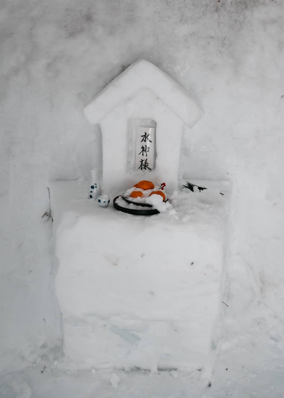 A small shrine made from snow at Tsurunoyu Onsen in Nyuto onsen, Akita, Tohoku, Japan.