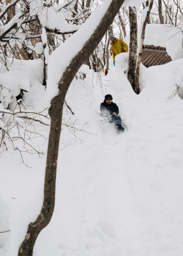 Sliding down the snow hill in Tazawako, Akita, Tohoku, Japan.