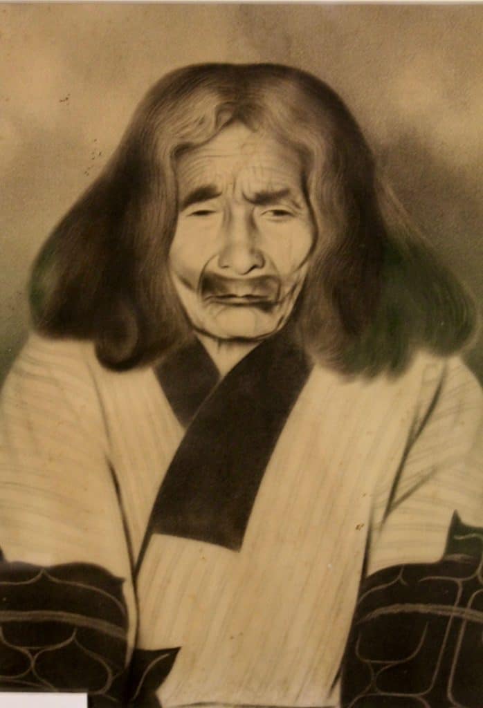 old photo of Ainu man, one of the indigenous people of Japan at the Kawamura Kaneto Ainu Memorial Museum