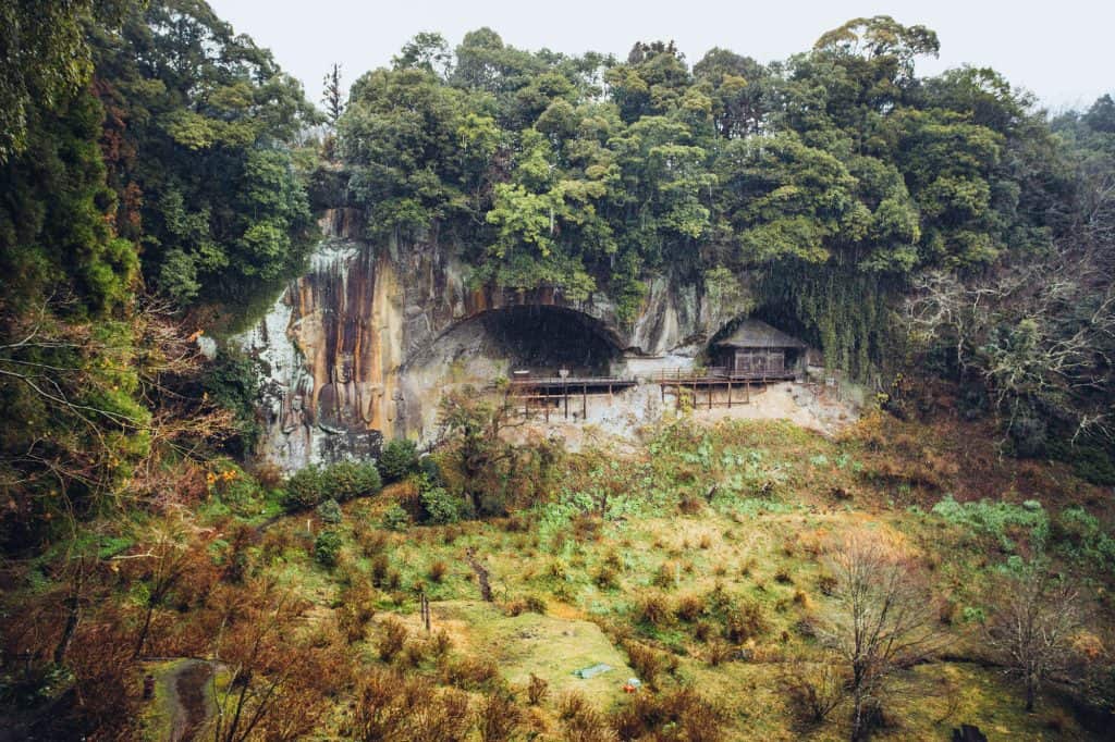 cliff-side Buddhist carvings in Japan