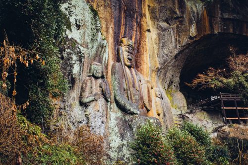Japanese Buddhist statues carved into rock in Oita Japan