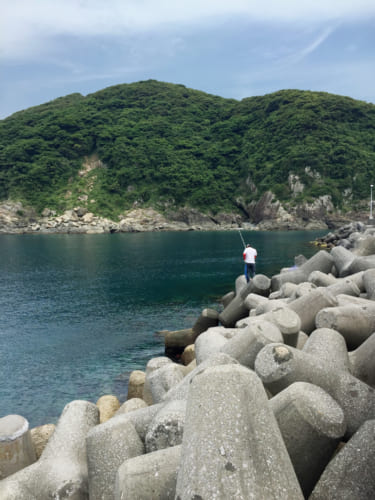 Fishermen fishing on Fukashima bay