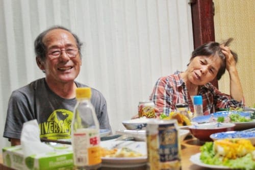 Enjoying a meal with a homestay family on Ojika Island