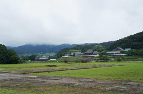 Tachibana-dera temple seen from the archaeological site of the ancient Kawahara-dera temple