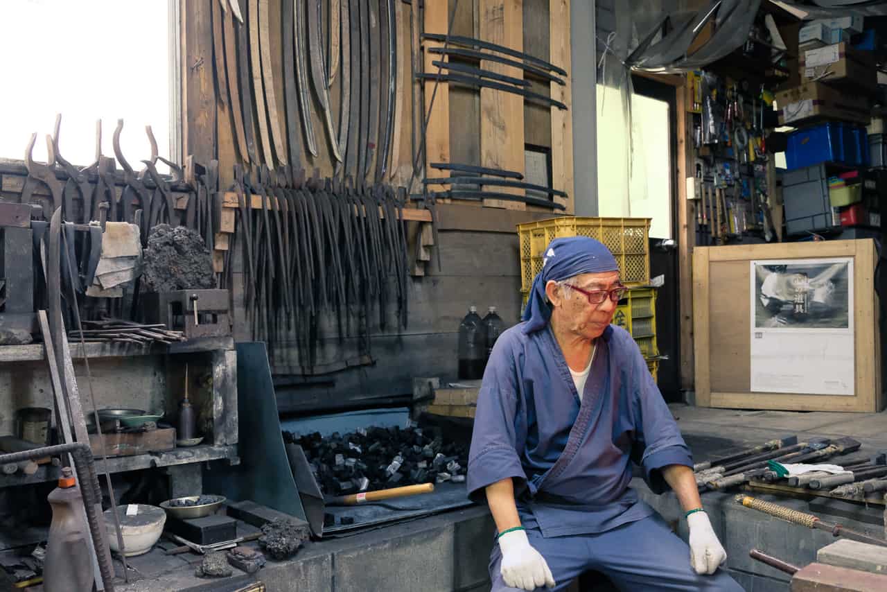 Traditional Japanese swordmaker in his studio in Kumamoto, Japan