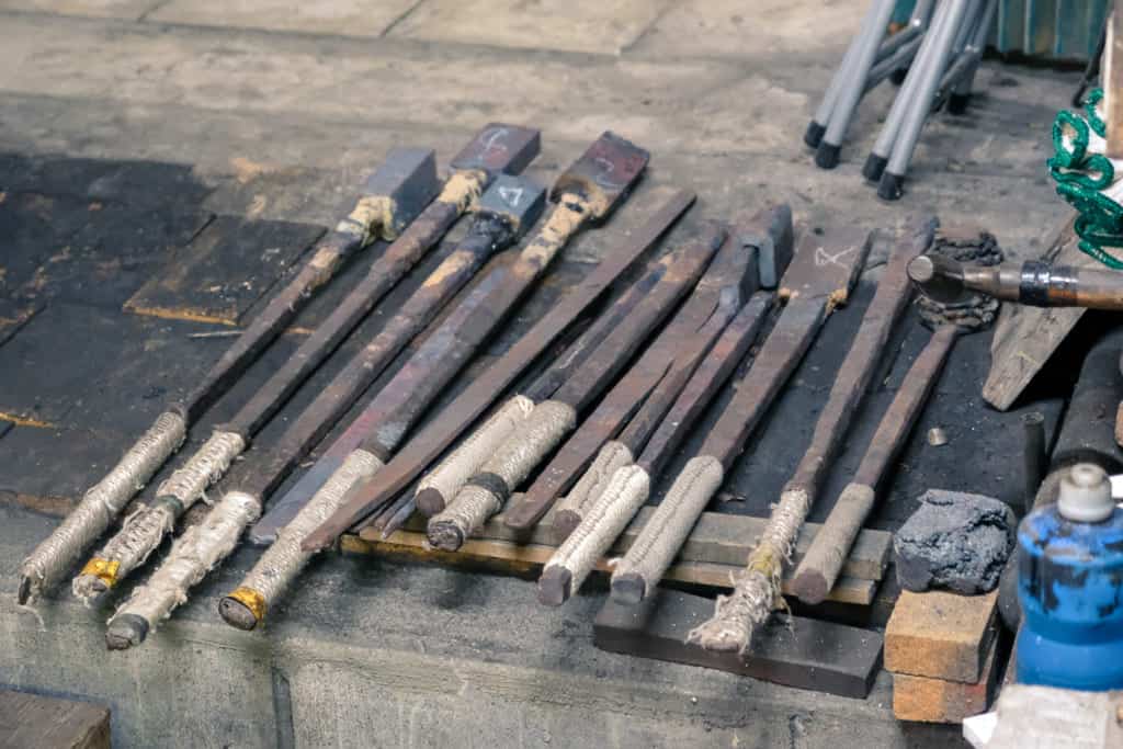 Japanese blacksmithing and samurai swords in various stages of completion in Kumamoto, Japan