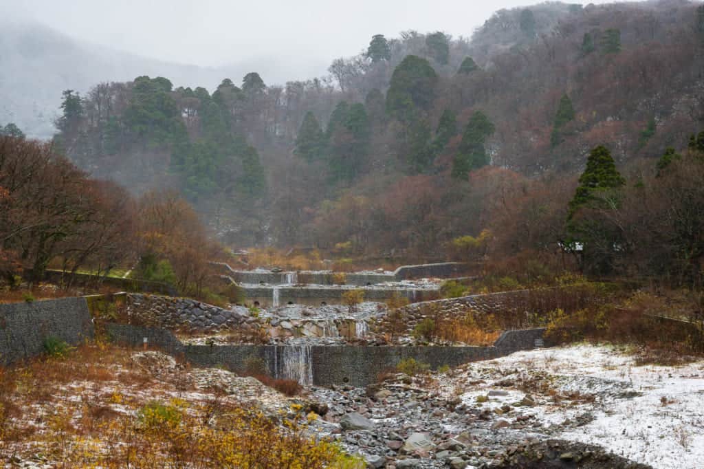 Gray Japanese landscape with dams near Mt. Daisen