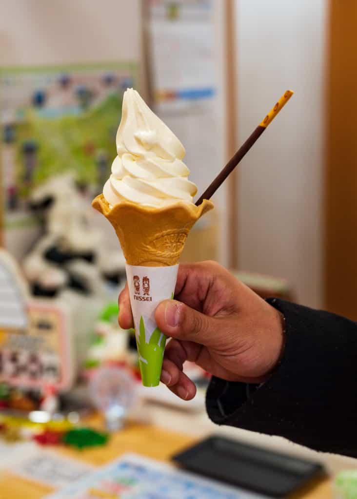 hand holdingn a soft-serve ice cream in Japan