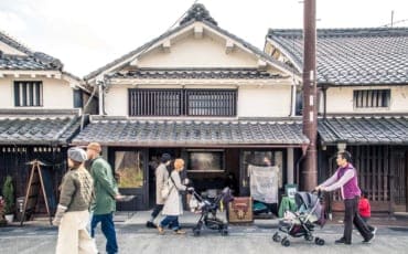 Tourists walking down Fukusumi district of Tamba-Sasayama