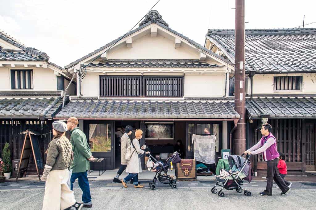 Tourists walking down Fukusumi district of Tamba-Sasayama