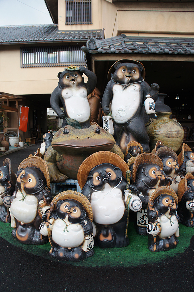 A group of ceramic Tanuki in traditional Shigaraki style