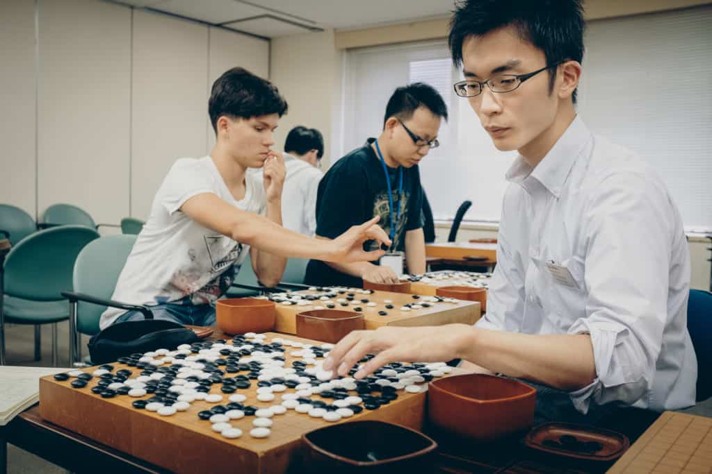 professional go player teaching the game in Japan