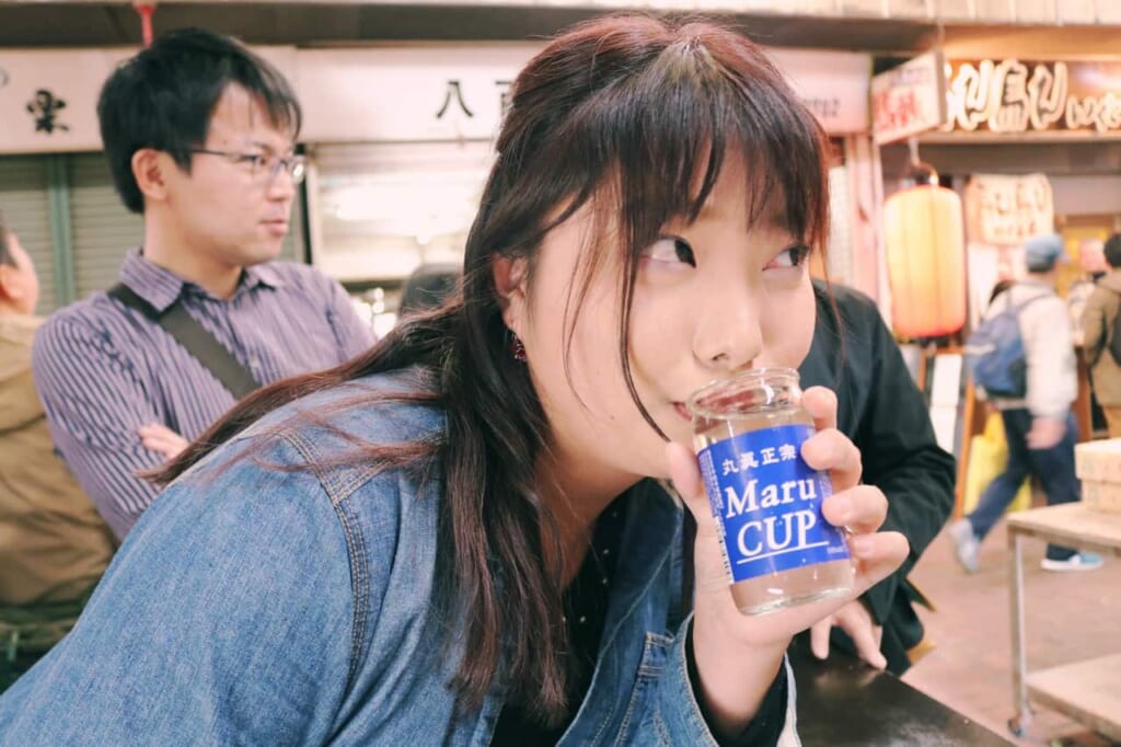 My friend drinking the dashiwari-sake