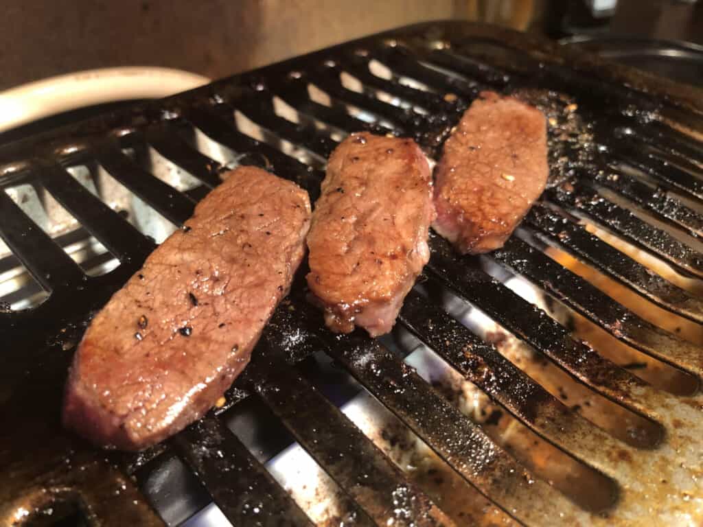 Meat being cooked  - Yakiniku