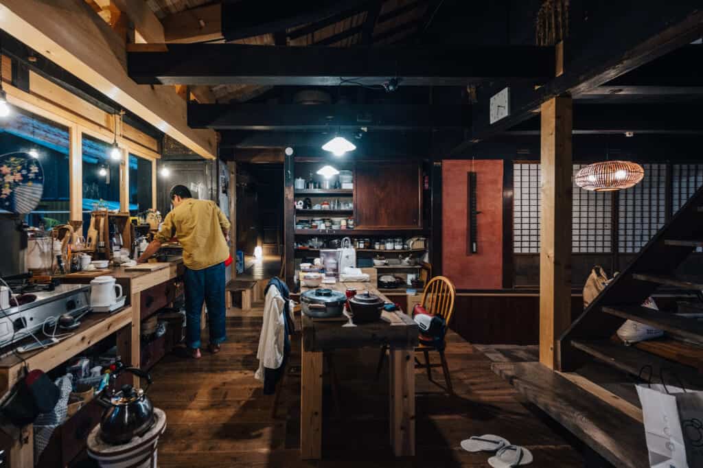 Kitchen and dining area of Yanoya kominka guesthouse in Ojika.