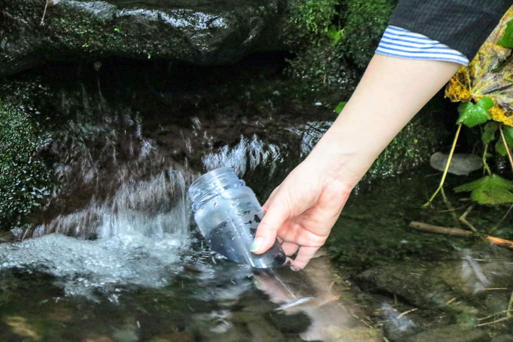 Refilling our bottles at Fresh Spring Waters at Kanro Spring on Rishiri Island,  Hokkaido