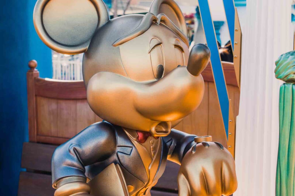 Mickey Mouse looking at his watch at Tokyo Disneyland