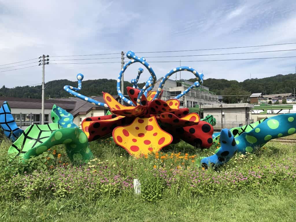 Colourful artwork Tsumari in Bloom, by Yayoi Kusama