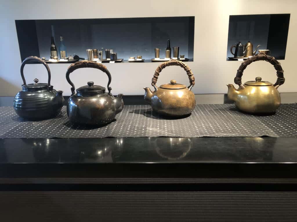 Metal teapots crafted at Gyokusendo in Niigata, Japan. 