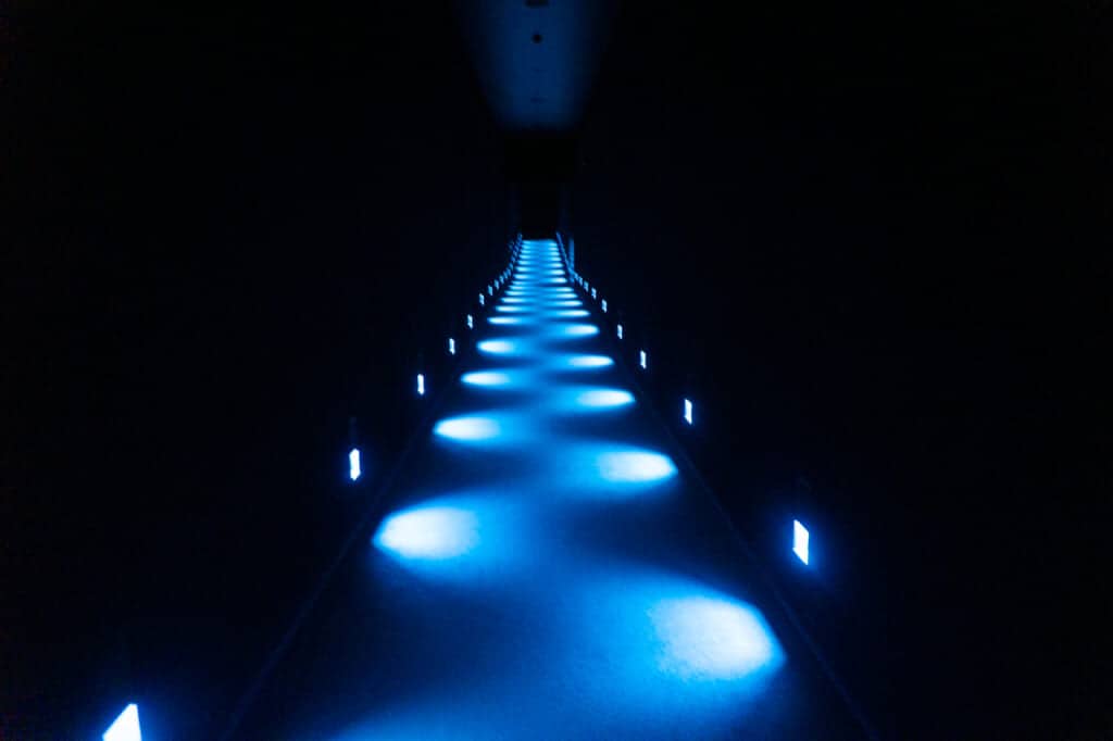 corridor with blue lights at teamlab planets