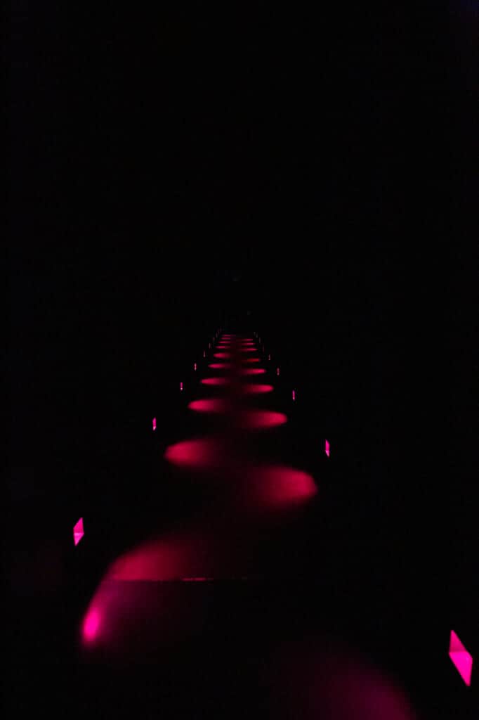 corridor with red lights at teamlab planets