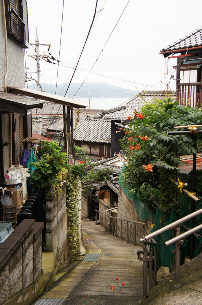 Steep residential street  on Manabeshima, a cat island in Japan