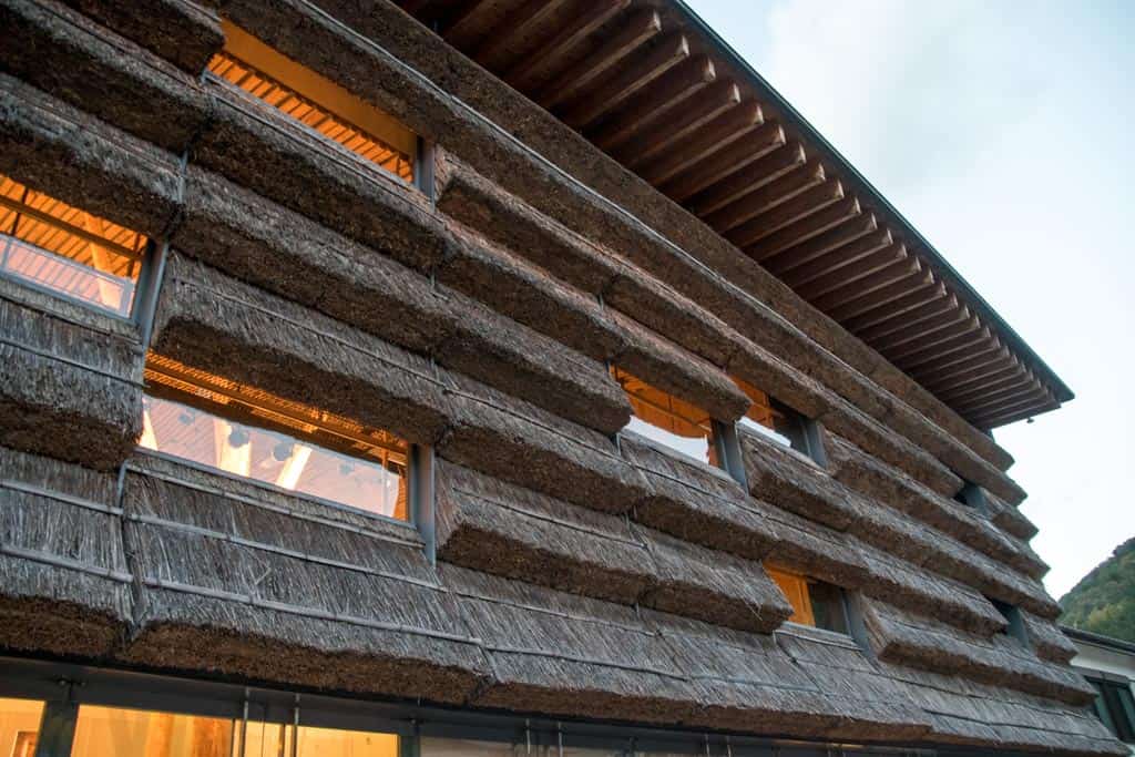 Kengo Kuma's Yusuhara Machino-eki, with thatched roof detailing in Yusuhara Town, Shikoku.