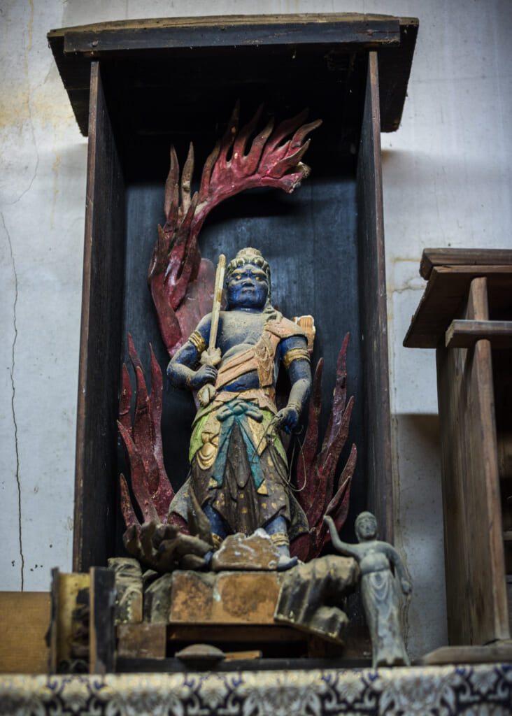 japanese statue in temple on goto islands