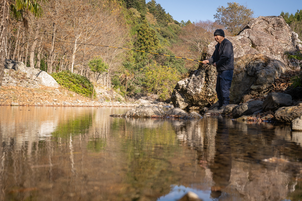 Man fishing in river in Japan