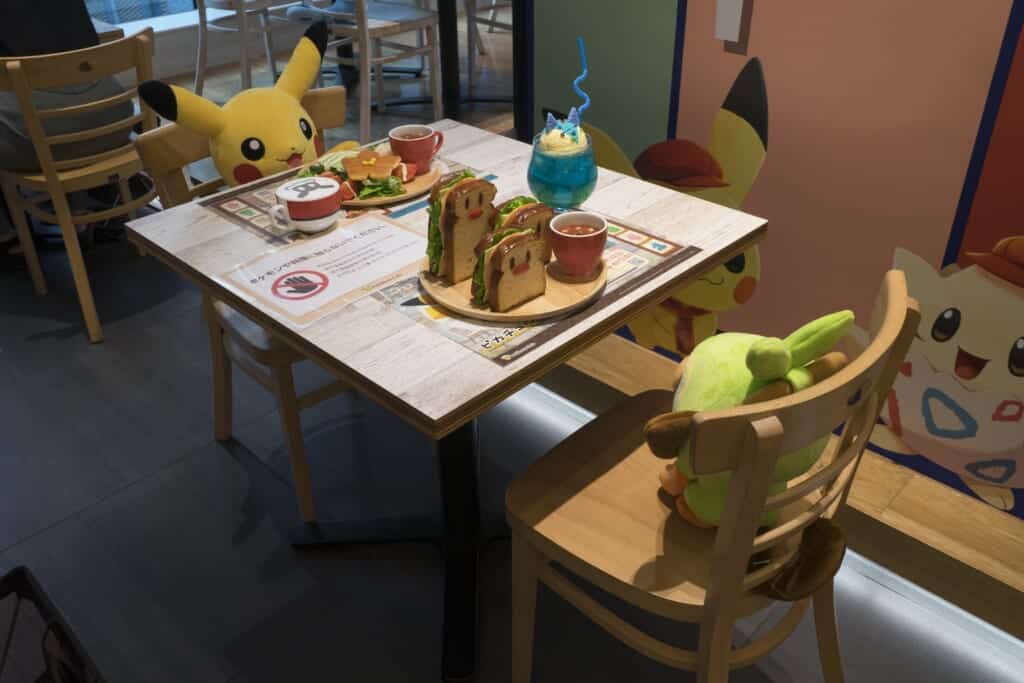 Pokémon eating at the Pokémon cafe in Tokyo