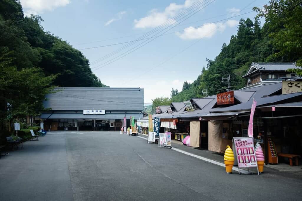 Yoshino train station with souvenir shops before hiking in Japan